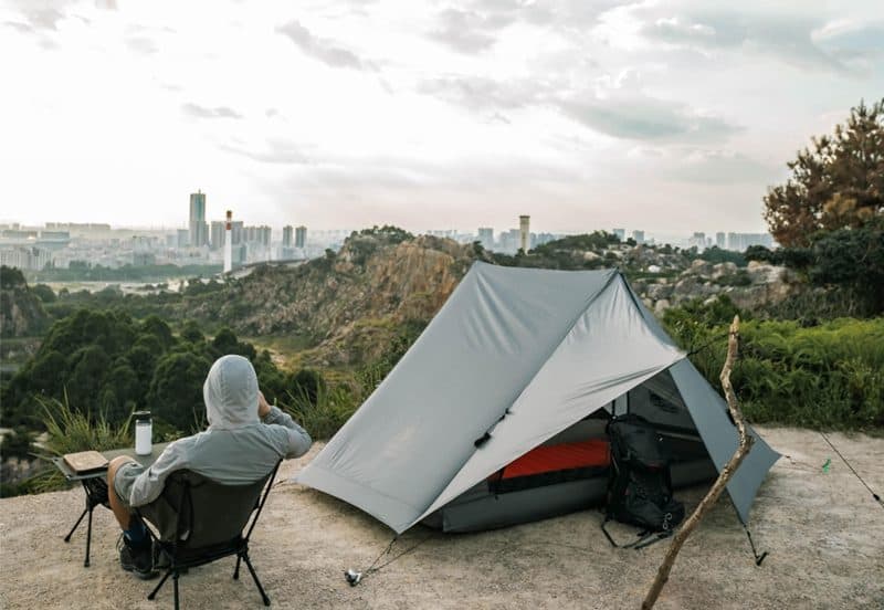 Guy enjoying OneTigris Mountain Ridge Camping Tent